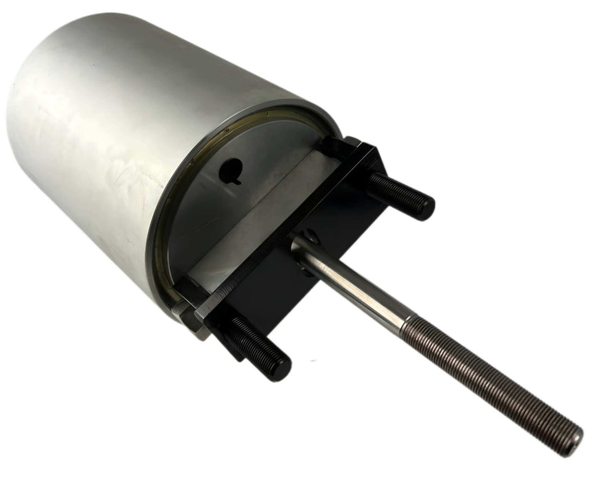 A tailgate cylinder for liftgates sitting on its side with the threaded rod