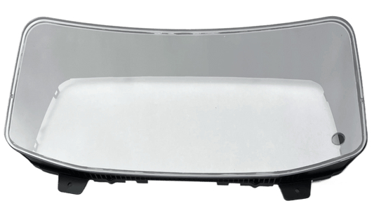 DD60026 International gauge cluster lens cover frame with a hole for trip reset buttom on a white background