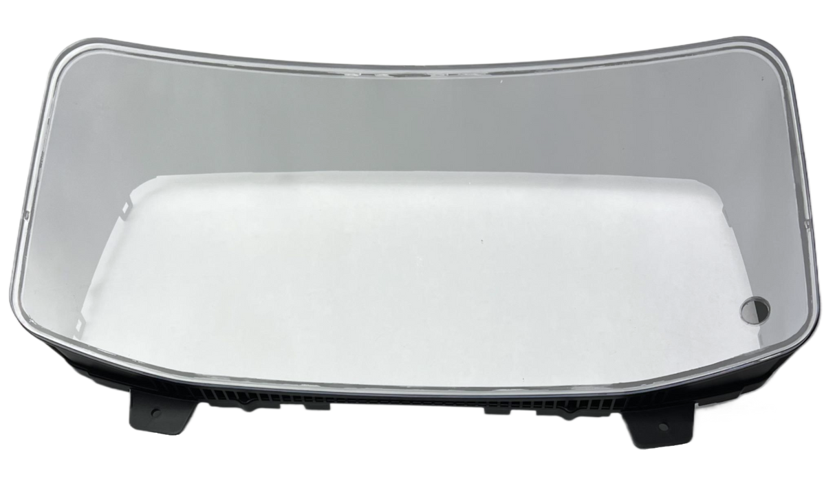 DD60026 International gauge cluster lens cover frame with a hole for trip reset buttom on a white background