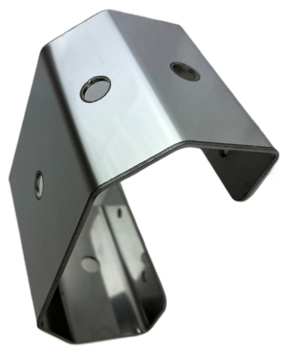 Top down view of a pedestal light mounting bracket showing the top 3 holes where a light can be mounted