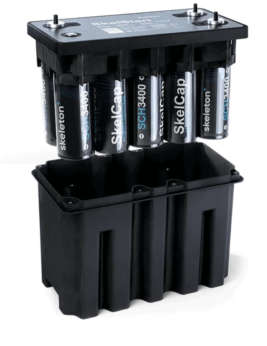 Internal components of the Skelstart Engine Start Module showing the ten supercapacitors hovering above the black case