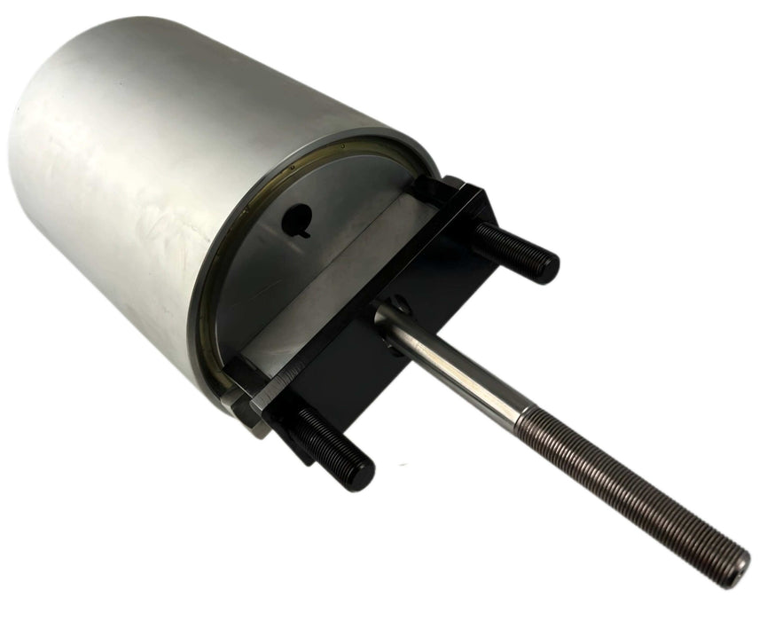 A tailgate cylinder for liftgates sitting on its side with the threaded rod 