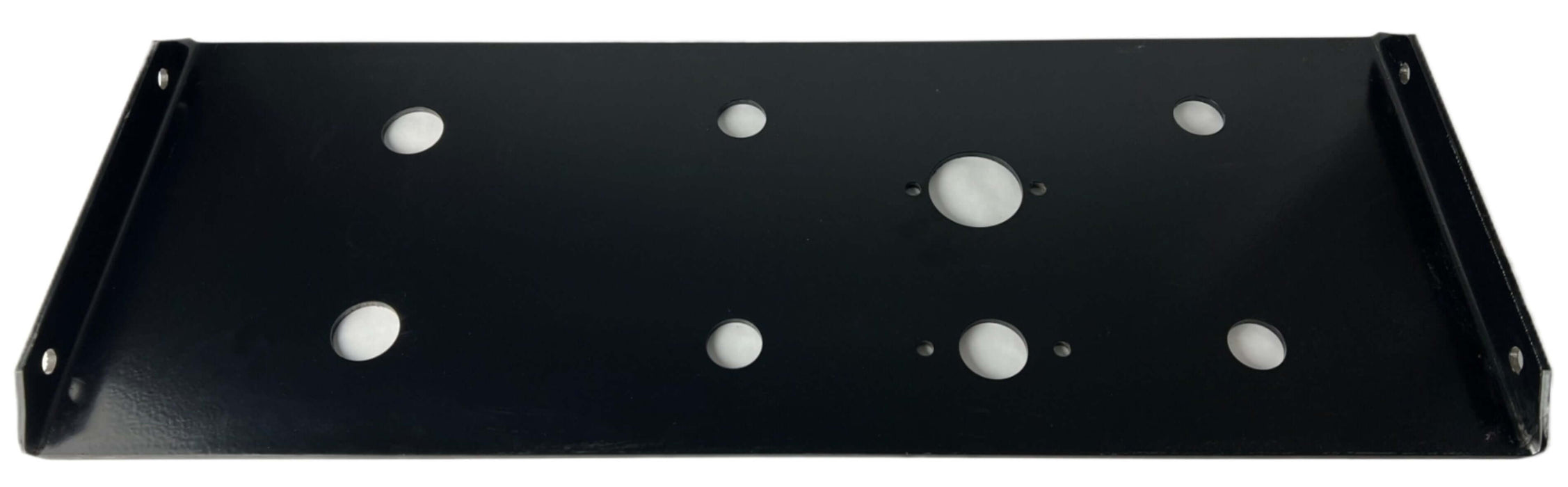 The bottom side of a rectangular black airline plate with 8 holes to run semi truck airline connections to trailer