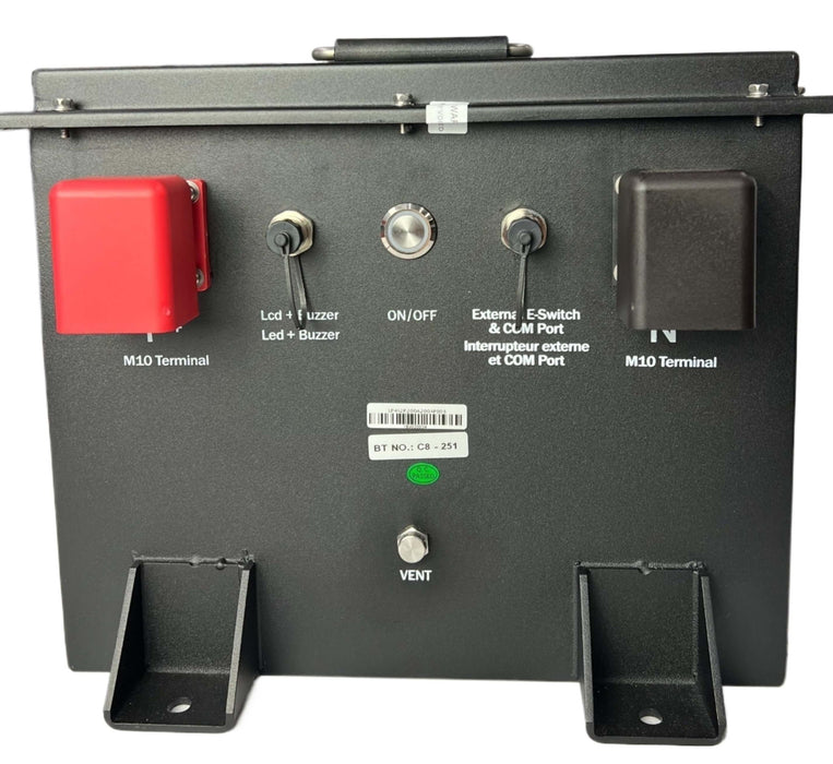 A control panel view of a black lithium truck battery showing the red and black terminal, cable connections, and on/off switch