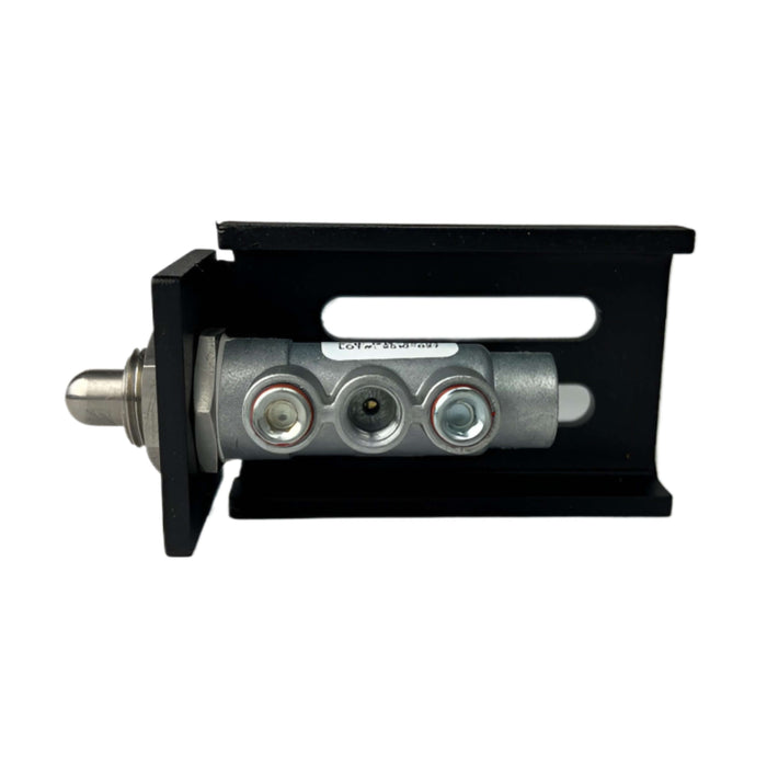 A metal hydraulic cylinder stroke limiter valve on a black mounting bracket with 2 plugged ports and 1 open port