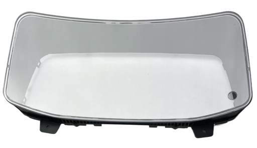 DD60026 International gauge cluster lens cover frame with a hole for trip reset buttom on a white background