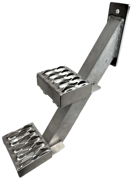 A universal mounting semi truck pedestal step with 2 bolt on steps with a diamond grip pattern on an angled beam with a flat mounting bracket