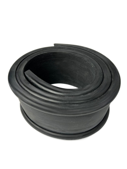 A volvo fuel tank strap isolator 3.5" wide by 53" long rolled up tightly into a roll